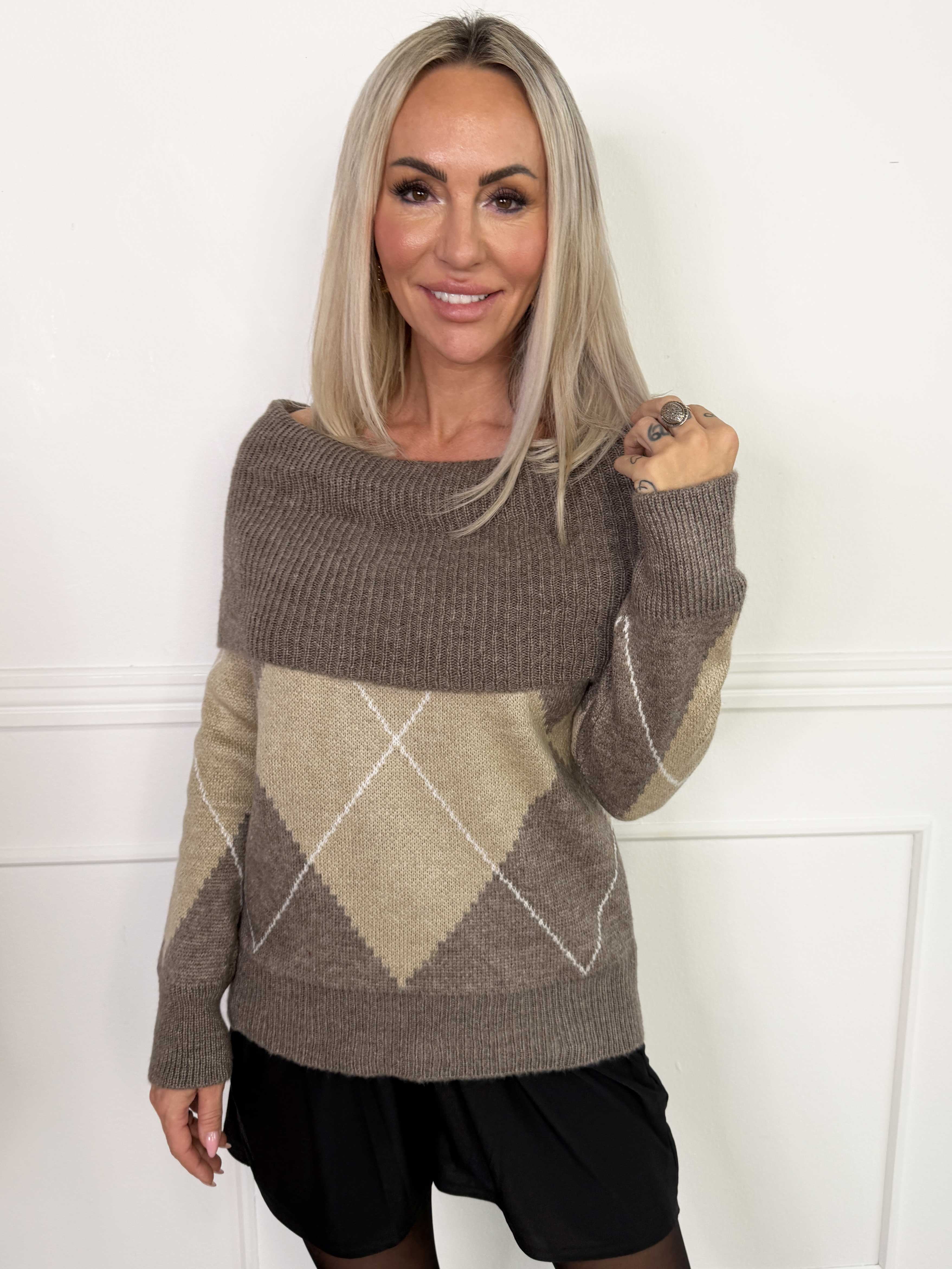 Paola - Off-shoulder strikbluse med mønster